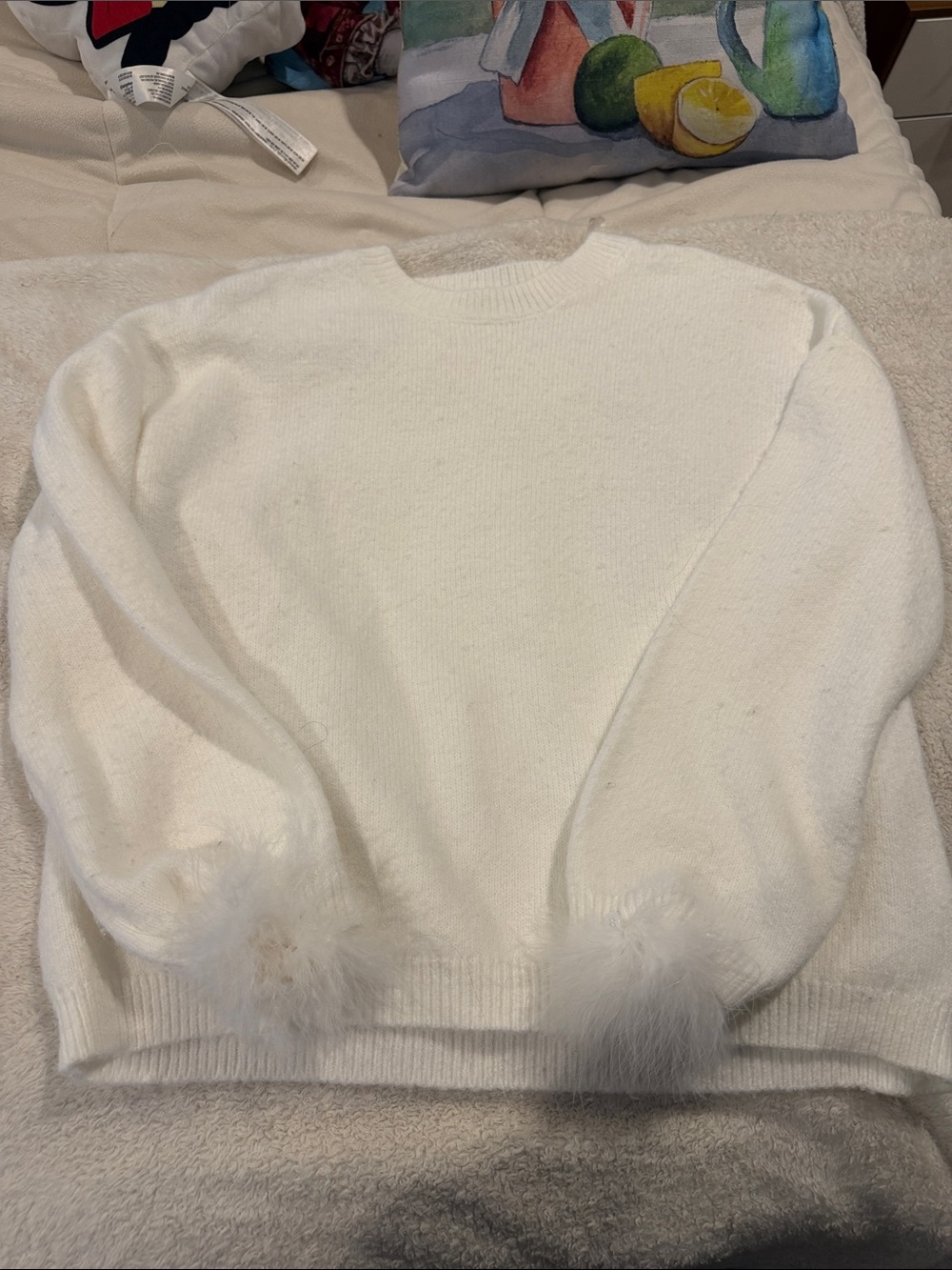 Francesca's Collections White Crewneck Sweater with Feather Cuff Accents